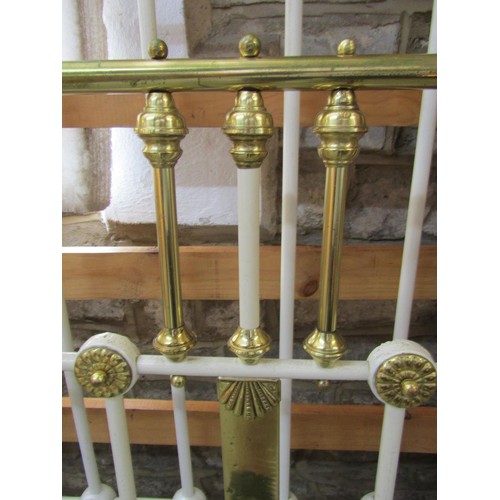 1375 - An Art Nouveau painted ironwork and polished brass double bed frame.