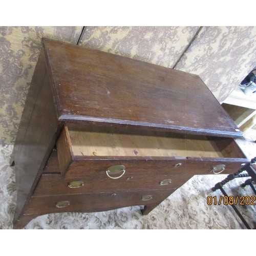 1386 - A 19th century oak bedroom chest of four long drawers with brass handles and escutcheons, 97cm high,... 