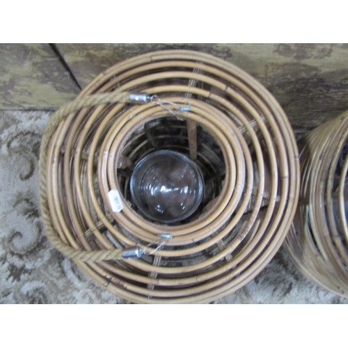 1388 - A large pair of ceiling hanging bamboo storm lanterns, with drop-in glass reservoirs, each 50cm high... 