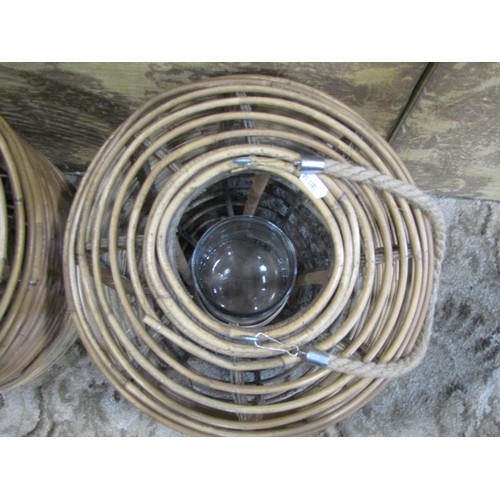 1388 - A large pair of ceiling hanging bamboo storm lanterns, with drop-in glass reservoirs, each 50cm high... 