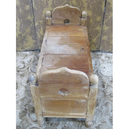 1390 - A small carved weathered teakwood box settle / commode, 55cm high, 97 x 40cm.