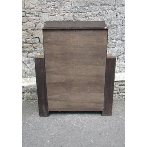 1398 - An Art Deco walnut display cabinet, with glazed panelled doors and stepped mounts enclosing addition... 