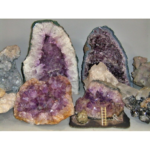 469 - A collection of amethyst rock crystals and other crystallised rock samples.