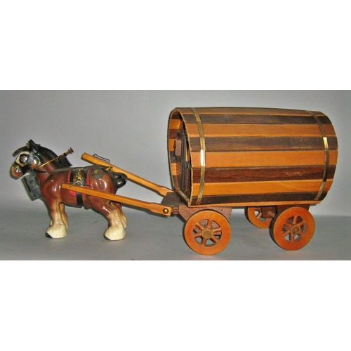 535 - A model traditional gypsy caravan pulled by a Beswick type horse together with a model wooden cart p... 