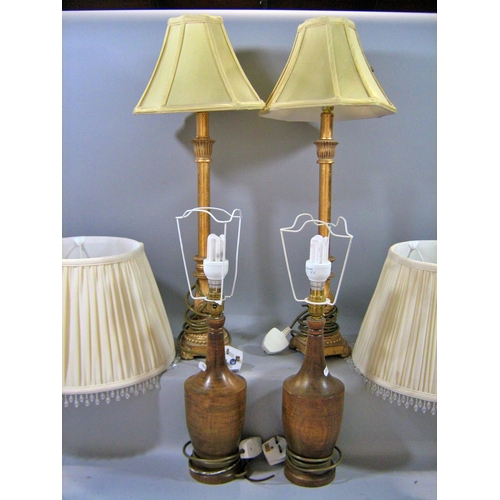 541 - A pair of wooden turned table lamps and a pair of candlestick table lamps, all with shades.