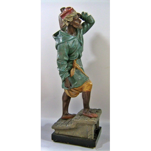 542 - A painted spelter figure of an Arab water carrier climbing cobbled steps, signed Henry Weisse to sid... 