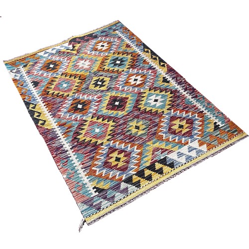 1764 - A Chobi kilim with an all over stepped diamond pattern 153cm x 103cm