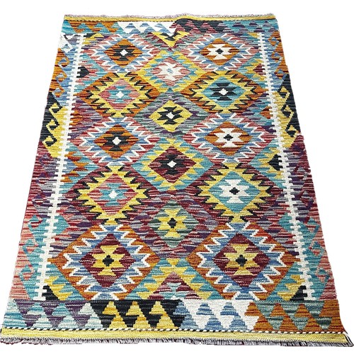 1764 - A Chobi kilim with an all over stepped diamond pattern 153cm x 103cm