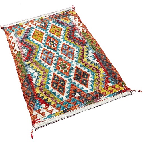 1769 - A Chobi kilim rug with alternating rows of diamonds  122cm x 83cm approximately