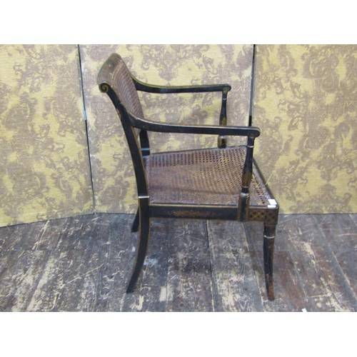 1448 - A Regency lacquered bergere chair on swept supports