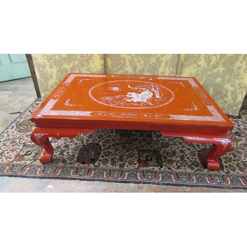 1456 - A red lacquered Chinese  mid  20th century occasional table of rectangular form inlaid in mother of ... 