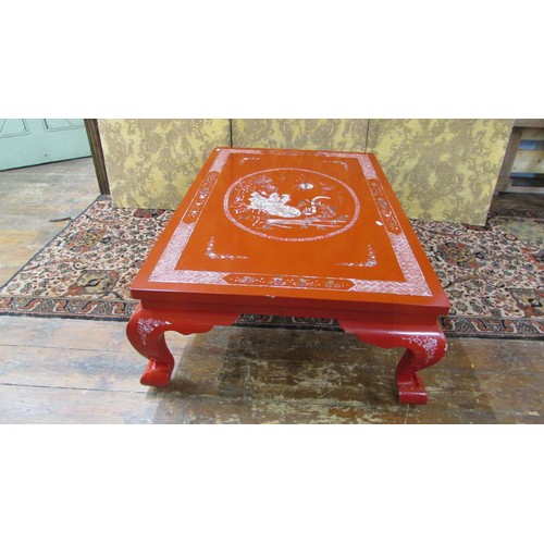 1456 - A red lacquered Chinese  mid  20th century occasional table of rectangular form inlaid in mother of ... 