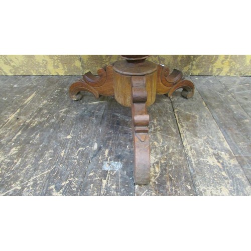 1458 - A 19th century occasional table in teak the heavy circular top raised on a turned pillar and tripod,... 