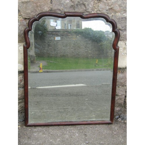 1408 - An 18th century walnut framed wall mirror, with bevelled plate, oak-backed, with old label verso ‘HY... 