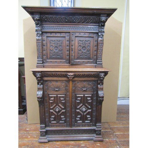 1461 - 19th century Gothic revival carved oak two sectional side cupboard the front elevation with profusel... 