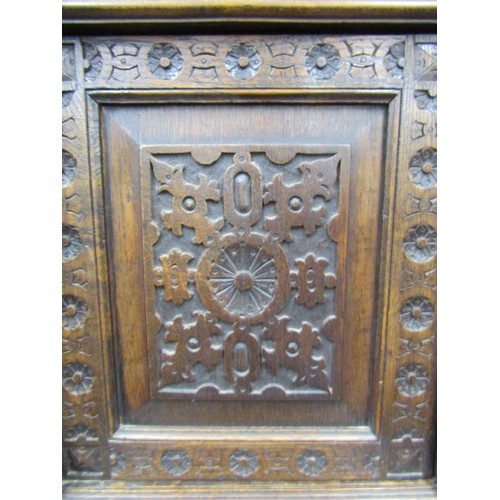 1461 - 19th century Gothic revival carved oak two sectional side cupboard the front elevation with profusel... 