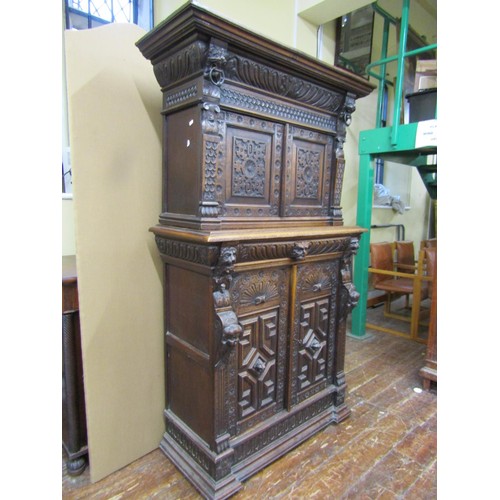 1461 - 19th century Gothic revival carved oak two sectional side cupboard the front elevation with profusel... 