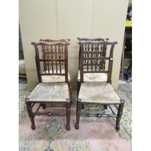 1463 - Four Georgian spindle back cottage chairs with rush seats