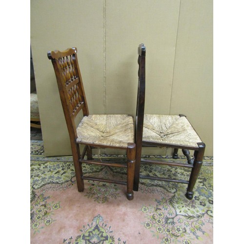 1463 - Four Georgian spindle back cottage chairs with rush seats