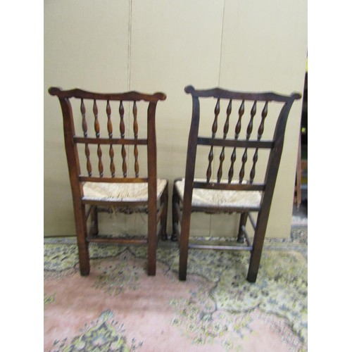 1463 - Four Georgian spindle back cottage chairs with rush seats