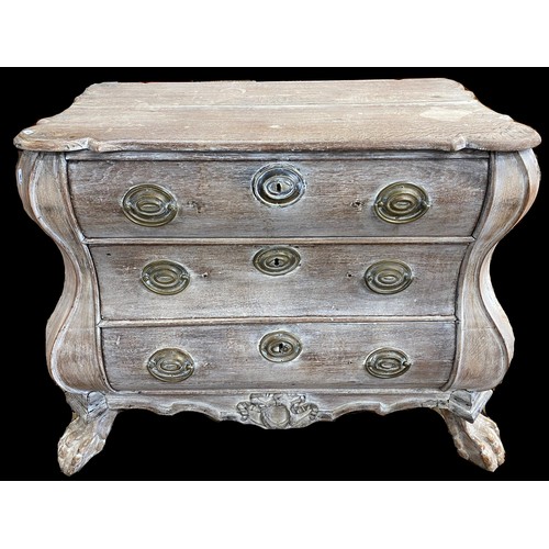 1464 - Small Dutch bombe chest of drawers in oak with lions paw feet, brass fittings and limed finish, 110c... 