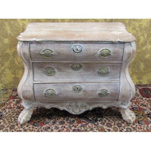 1464 - Small Dutch bombe chest of drawers in oak with lions paw feet, brass fittings and limed finish, 110c... 