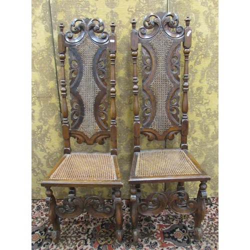 1469 - A pair of Carolean side chairs in beechwood on shaped supports and stretchers