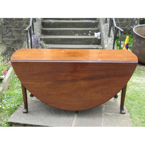 1471 - A large 19th century mahogany table with two drop leaves, raised on pad feet, 160cm wide x 60cm when... 