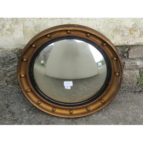 1424 - A Regency style gilt framed convex wall mirror, 47cm diameter.