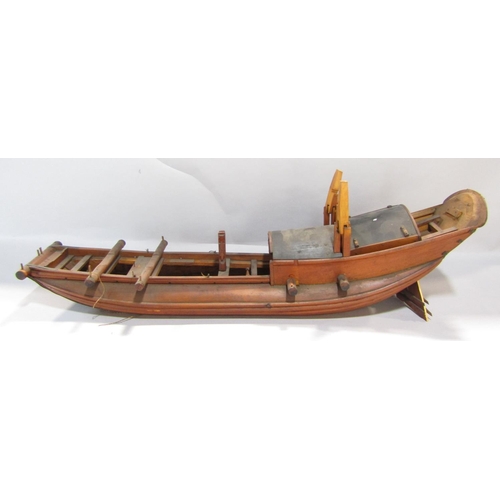 551 - A 20th century scratch-built model of a Chinese junk/boat with detailed rigging, 62 cm long together... 