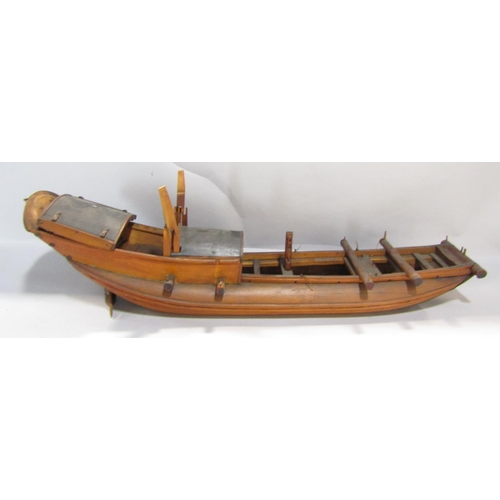 551 - A 20th century scratch-built model of a Chinese junk/boat with detailed rigging, 62 cm long together... 