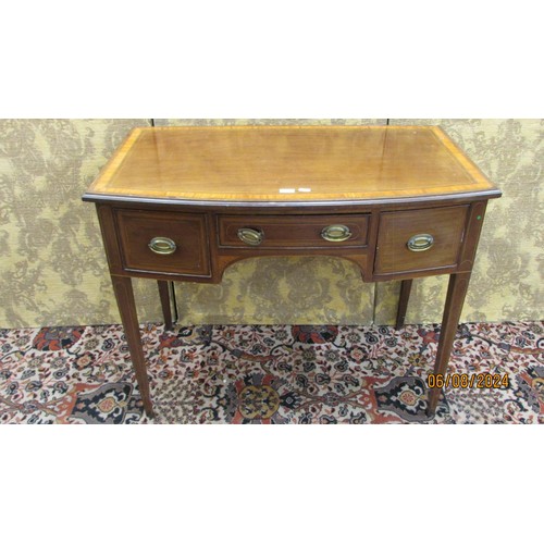 1490 - A late 19th century mahogany bowfronted side table with three drawers on square taper legs, with sat... 