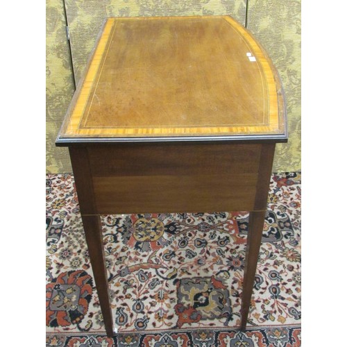 1490 - A late 19th century mahogany bowfronted side table with three drawers on square taper legs, with sat... 