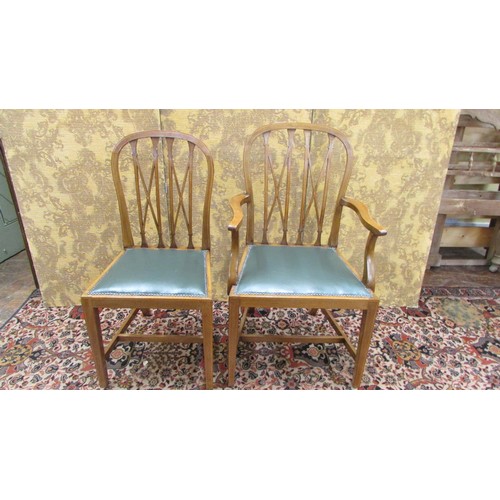 1492 - A set of eight (6+2) mahogany dining chairs by Warings of London, the lattice work backs with satinw... 