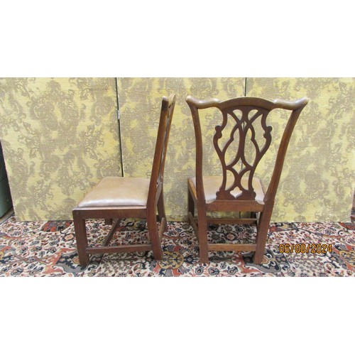 1495 - A pair of Georgian oak children's chairs with carved and pierced Gothic tracery splats, hide upholst... 