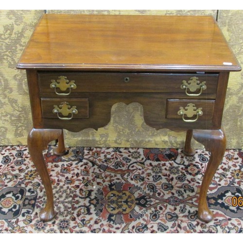 1499 - A 19th century mahogany lowboy enclosing frieze drawers raised on four pad feet, 70cm wide