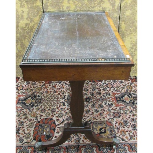 1500 - A small Regency rosewood ladies writing table enclosing two frieze drawers over a stretcher base, sw... 