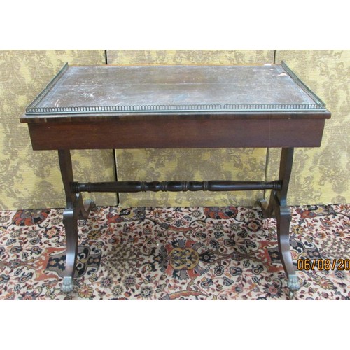 1500 - A small Regency rosewood ladies writing table enclosing two frieze drawers over a stretcher base, sw... 