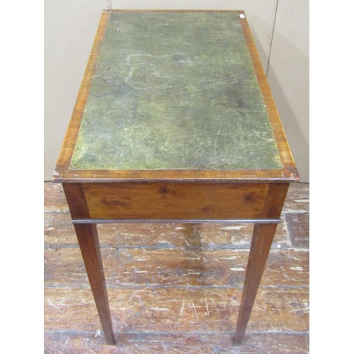 1504 - A 19th century mahogany writing table with inset top, over a frieze drawer and square tapered legs, ... 