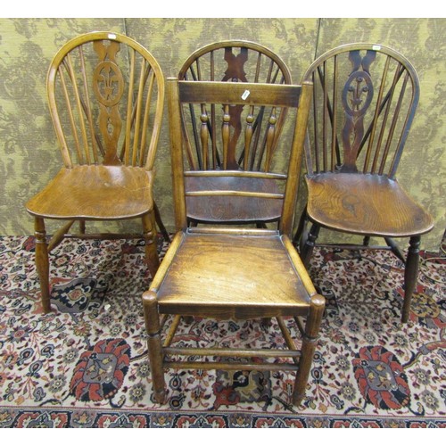 1508 - Three similar Georgian Windsor kitchen chairs principally in elm and ash woods, the shaped fruitwood... 