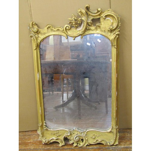 1526 - A 19th century gilt framed mirror in the rococo style, 100cm x 60cm