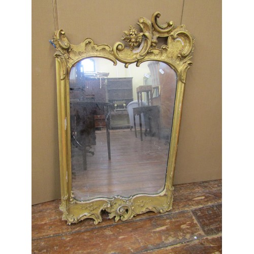 1526 - A 19th century gilt framed mirror in the rococo style, 100cm x 60cm