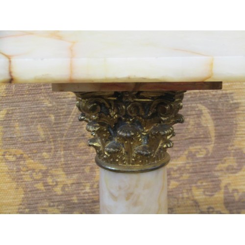 1527 - A 19th century onyx torchiere of classical design, the square cut base supporting a cylindrical colu... 