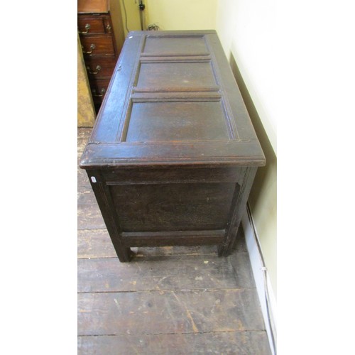 1533 - An 18th century panelled oak coffer, the rising lid on moulded framework, 71cm high, 122 x 55cm