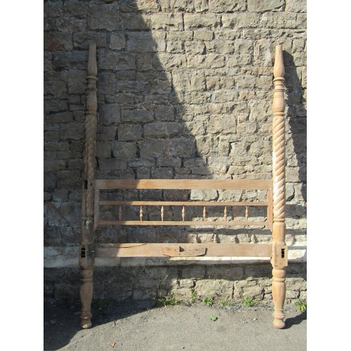 1538 - A 19th century Indian four poster bedstead in teak with spiral column supports, spindle moulded and ... 