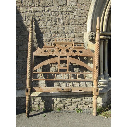 1538 - A 19th century Indian four poster bedstead in teak with spiral column supports, spindle moulded and ... 