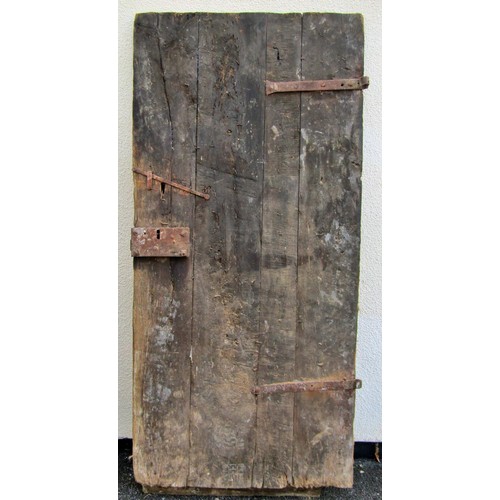 1542A - An early English iron studded planked oak door, 201 x 91cm