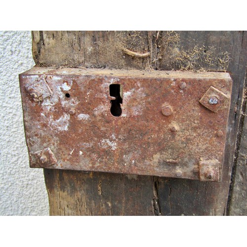 1542A - An early English iron studded planked oak door, 201 x 91cm