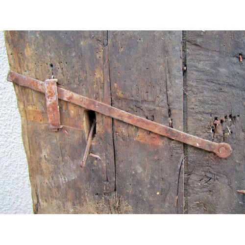 1542A - An early English iron studded planked oak door, 201 x 91cm