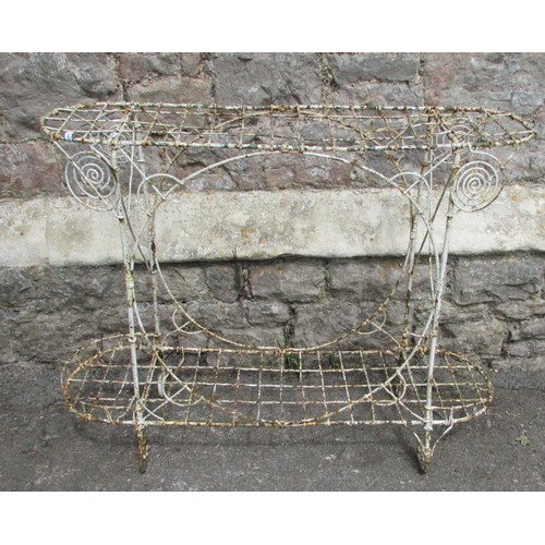 1131 - An old weathered painted two-tier wirework greenhouse/conservatory plant stand, 73cm high, 94 x 28cm... 